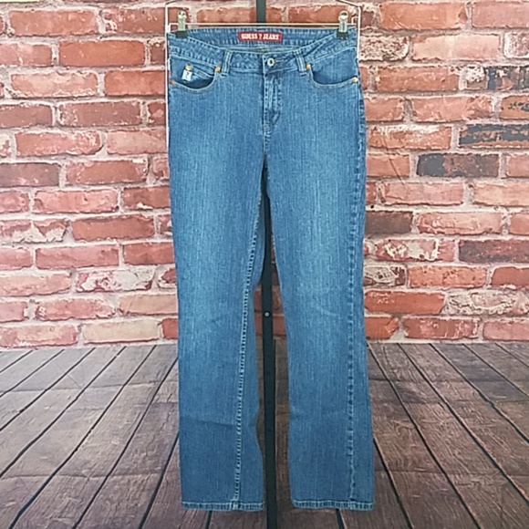 jeans with triangle logo on back pocket